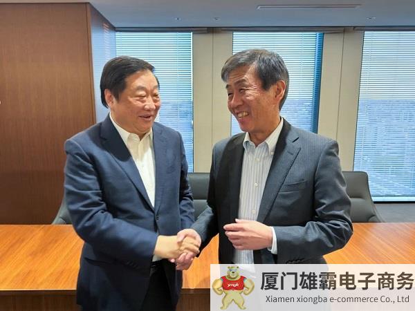 谭旭光与日本五十铃社长片山正则座谈交流